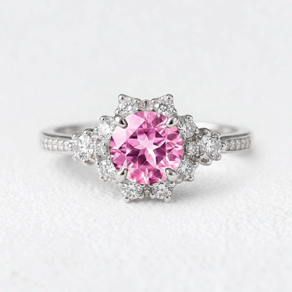 Marina’s Embrace | Round Pink Sapphire Engagement Ring