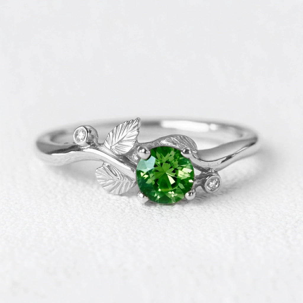 Ariadne’s Twine | Round Natural Emerald & Organic Vine Ring.