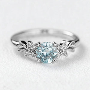Marina’s Foliage | Round Blue Aquamarine Leafy Engagement Ring.