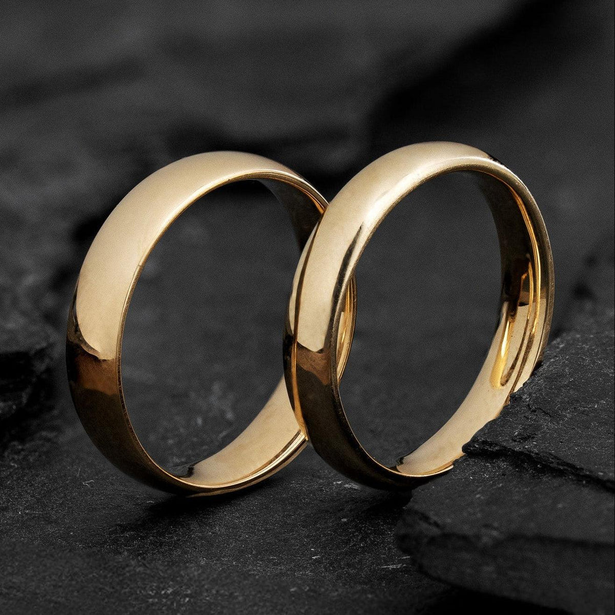 The Mirrored Pair – Polished Arc Wedding Bands in Solid Gold.