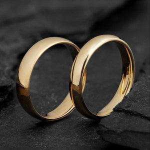 The Mirrored Pair – Polished Arc Wedding Bands in Solid Gold.