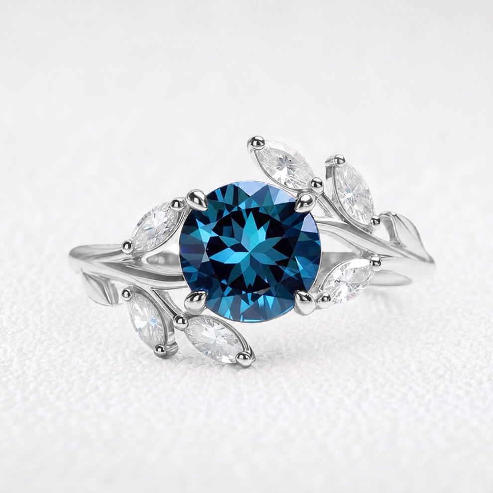 Eleonora’s Radiance | Round Blue Sapphire Vine Engagement Ring