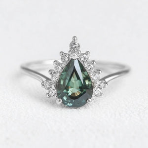 Mermaid’s Crown | Pear Teal Sapphire Halo Engagement Ring.
