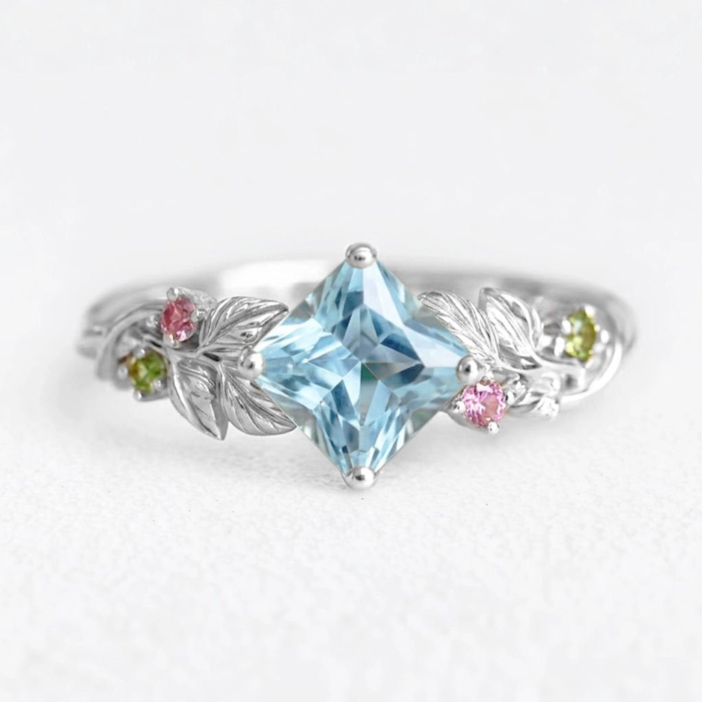 Cressida’s Stillness | Clear Blue Aquamarine Leafy Engagement Ring.