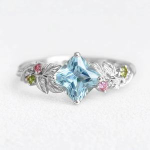 Cressida’s Stillness | Clear Blue Aquamarine Leafy Engagement Ring.