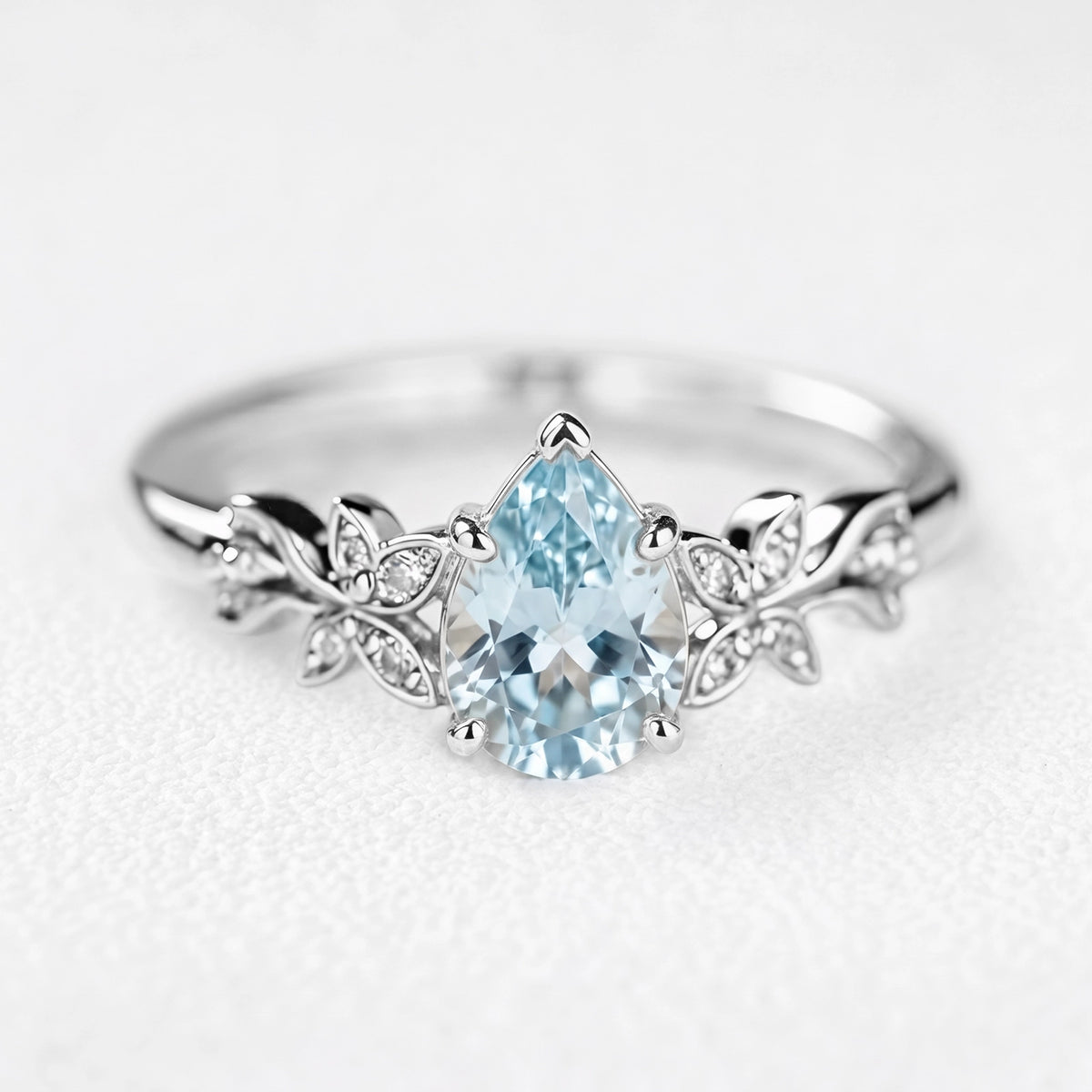 Marina’s Foliage | Pear Blue Aquamarine Botanical Engagement Ring