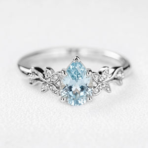 Marina’s Foliage | Pear Blue Aquamarine Botanical Engagement Ring