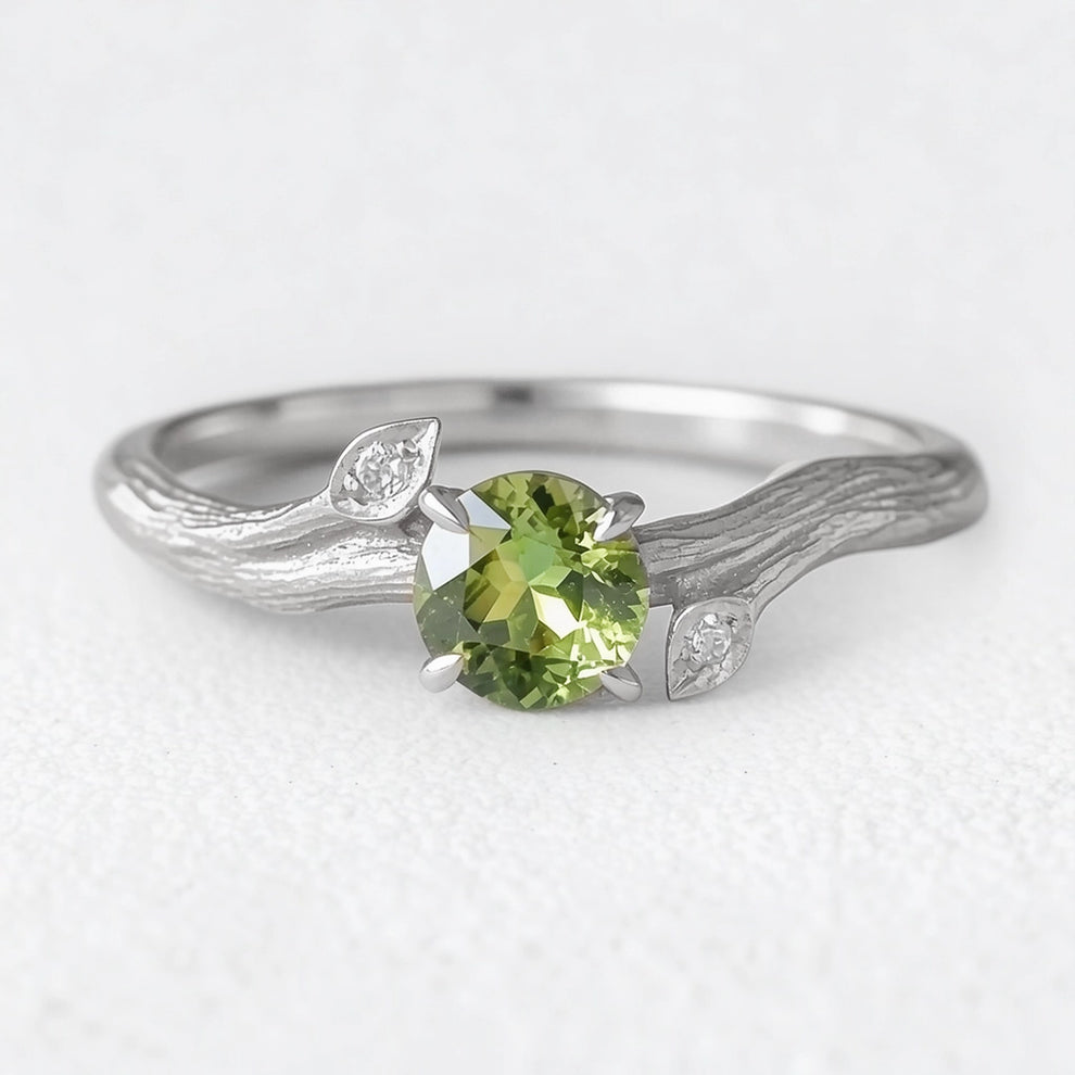 Ivy’s Verdant | Round Peridot Vine Engagement Ring.