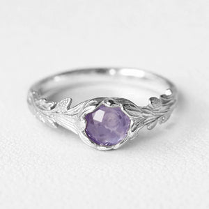 Daphne’s Branch | Round Tanzanite Engagement Ring with Sculptural Vine Band.