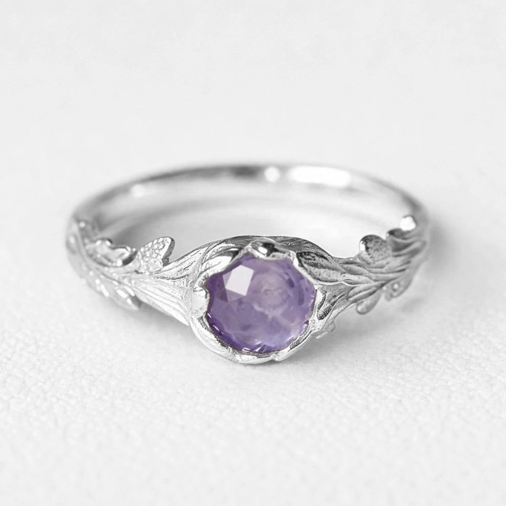 Daphne’s Branch | Round Tanzanite Engagement Ring with Sculptural Vine Band.