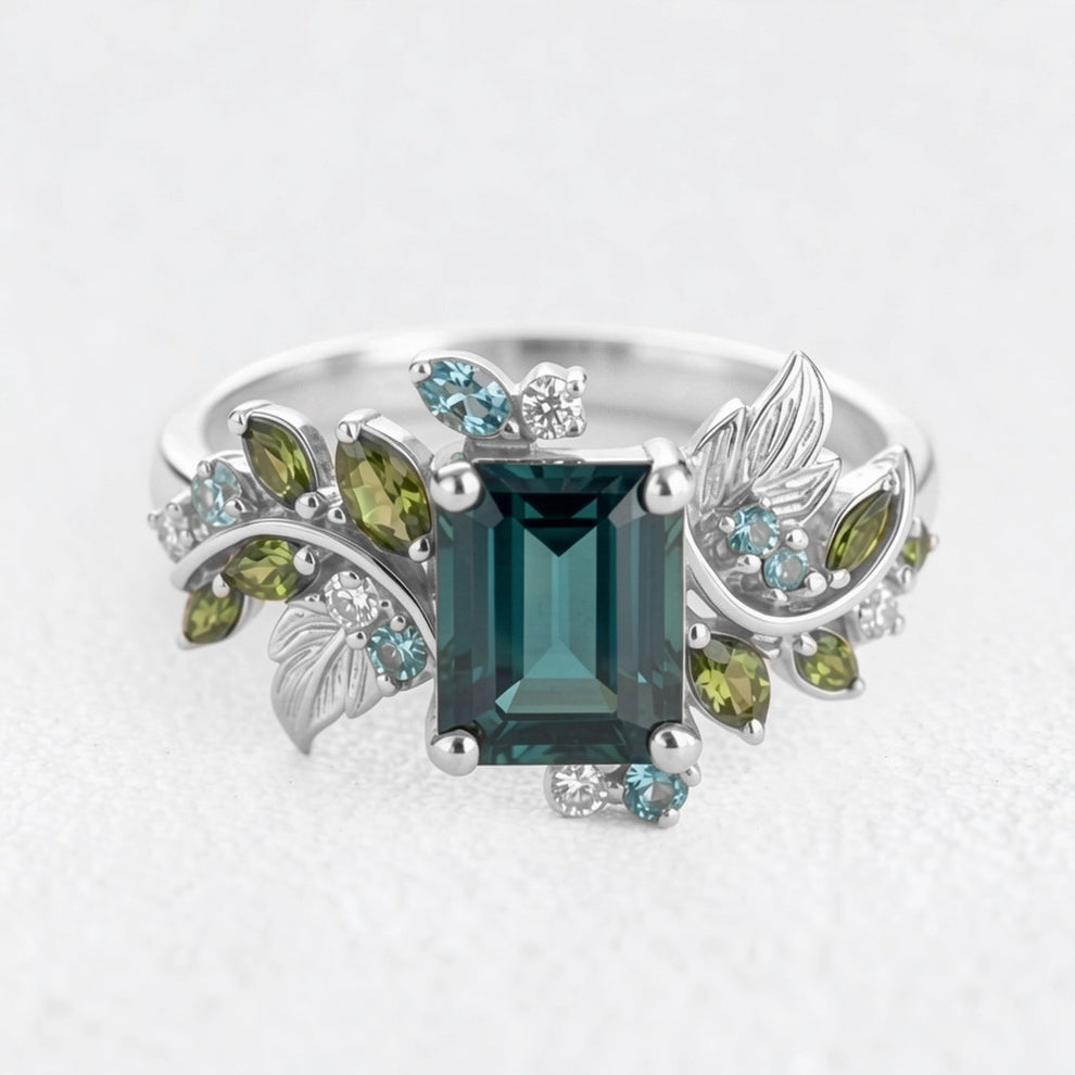 Ivy’s Embrace | Emerald Cut Blue Green Tourmaline Vine & Leaf Engagement Ring.