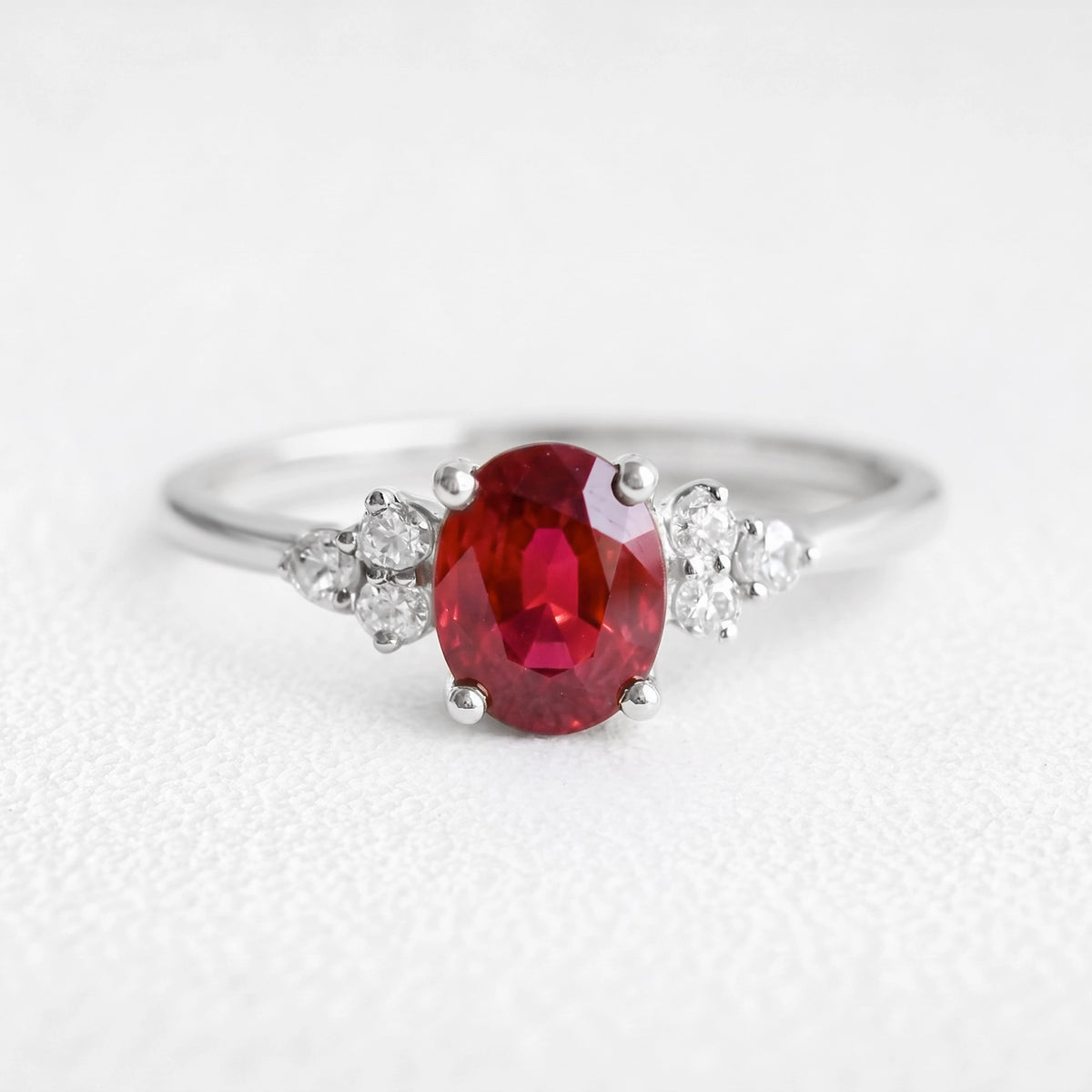 Valencia’s Crimson | 1.5CT Oval Ruby & Diamond Cluster Engagement Ring
