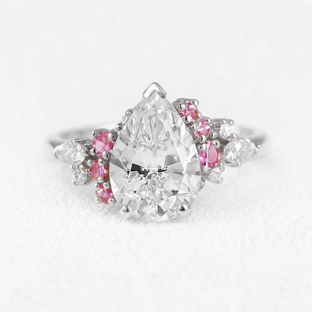 Aurora’s Kiss | 2CT Pear Cut Diamond Gold Engagement Ring.
