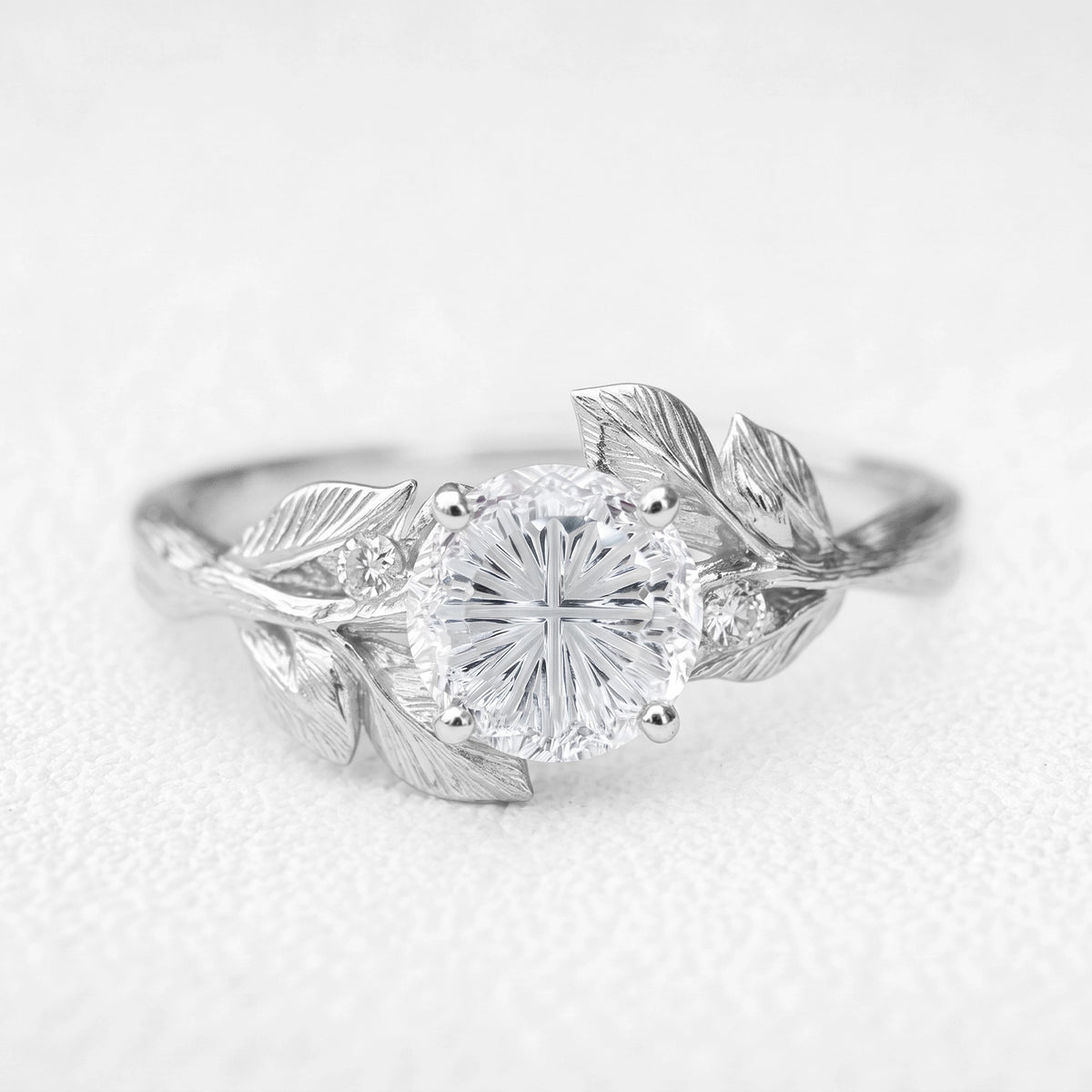 Daphne’s Dawn | Round Fantasy-Cut White Sapphire Foliage Engagement Ring