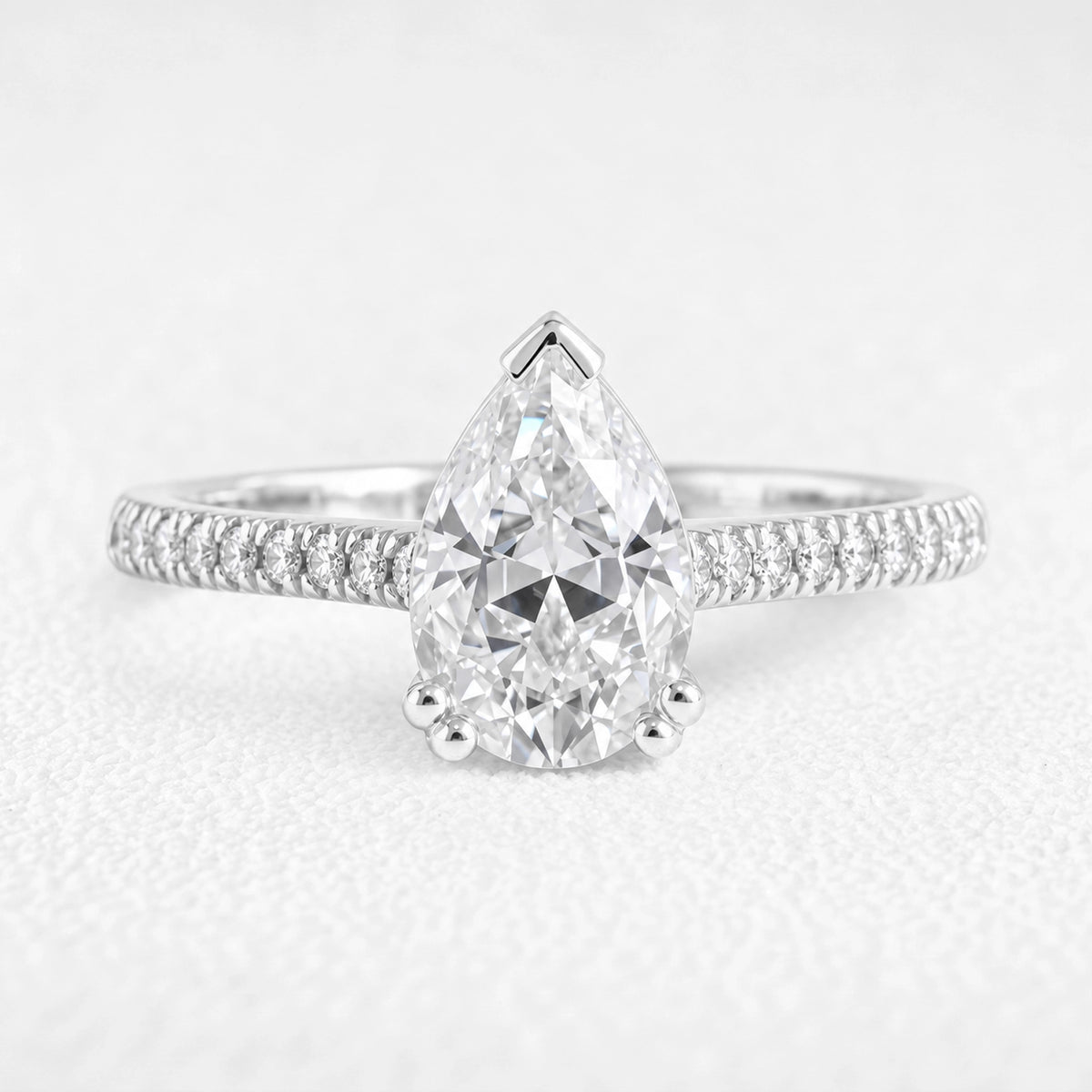 Aurora’s Reverie | 1.5CT Pear Diamond Solitaire Pave Engagement Ring