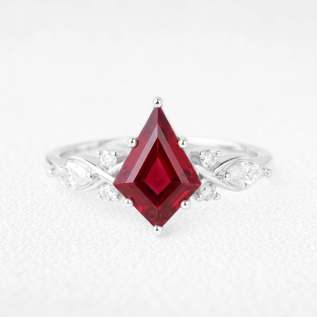 Aphrodite’s Pomegranate | Kite-Cut Ruby Foliage Engagement Ring
