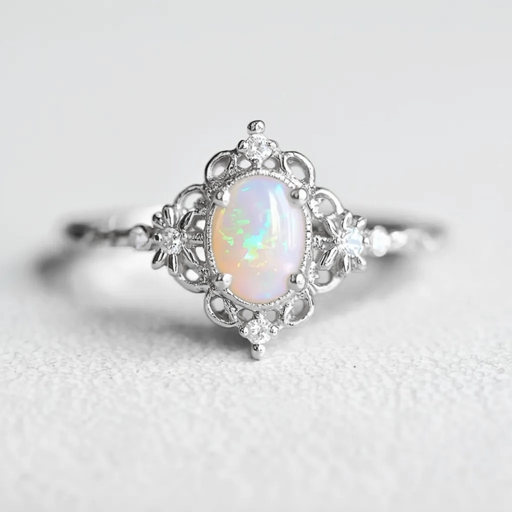 Aurora’s Sheen |  Classic Oval Opal Antique Engagement Ring.