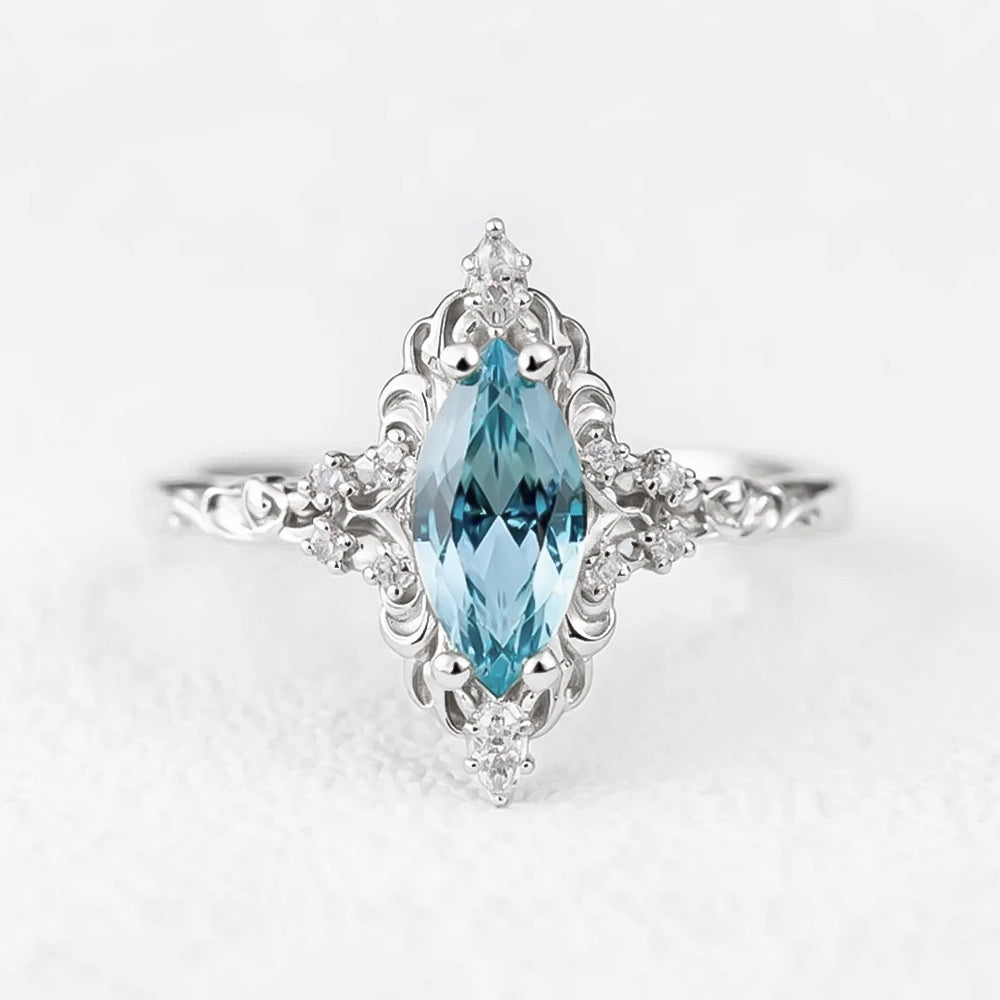 Aurora’s Swirl | Vintage Marquise Aquamarine Filigree Engagement Ring.