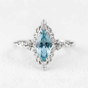 Aurora’s Swirl | Vintage Marquise Aquamarine Filigree Engagement Ring.