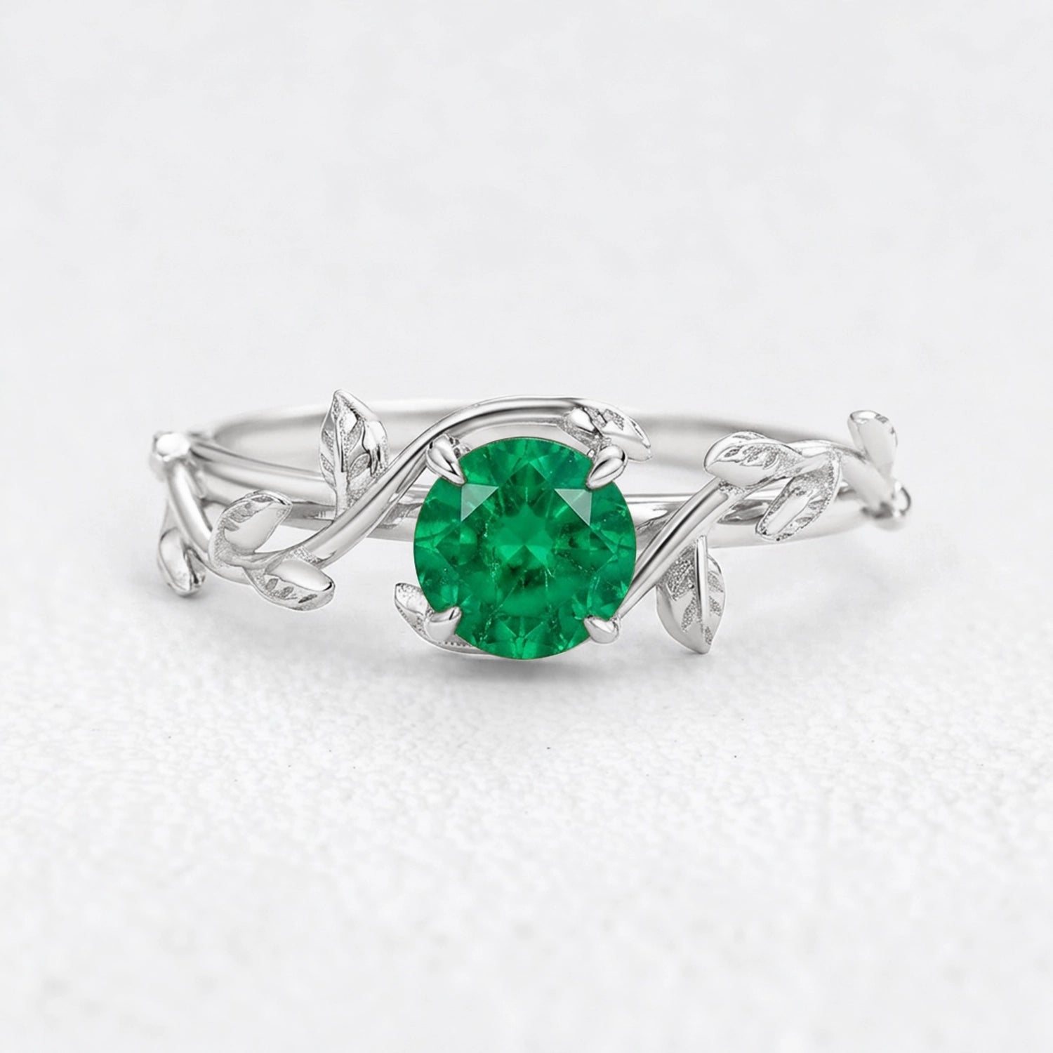 Isadora’s Eden | Round Emerald Foliage Engagement Ring