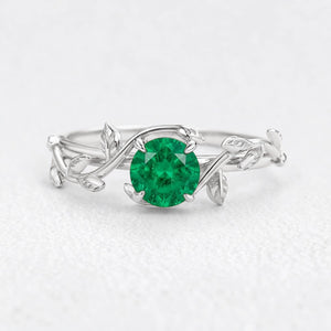 Isadora’s Eden | Round Emerald Foliage Engagement Ring