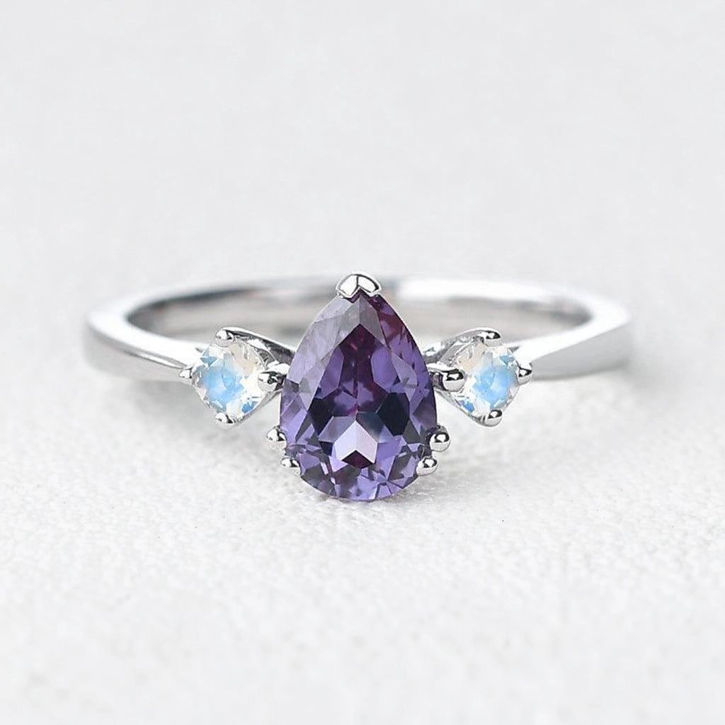 Selene’s Mirage | Pear Tanzanite & Moonstone Engagement Ring