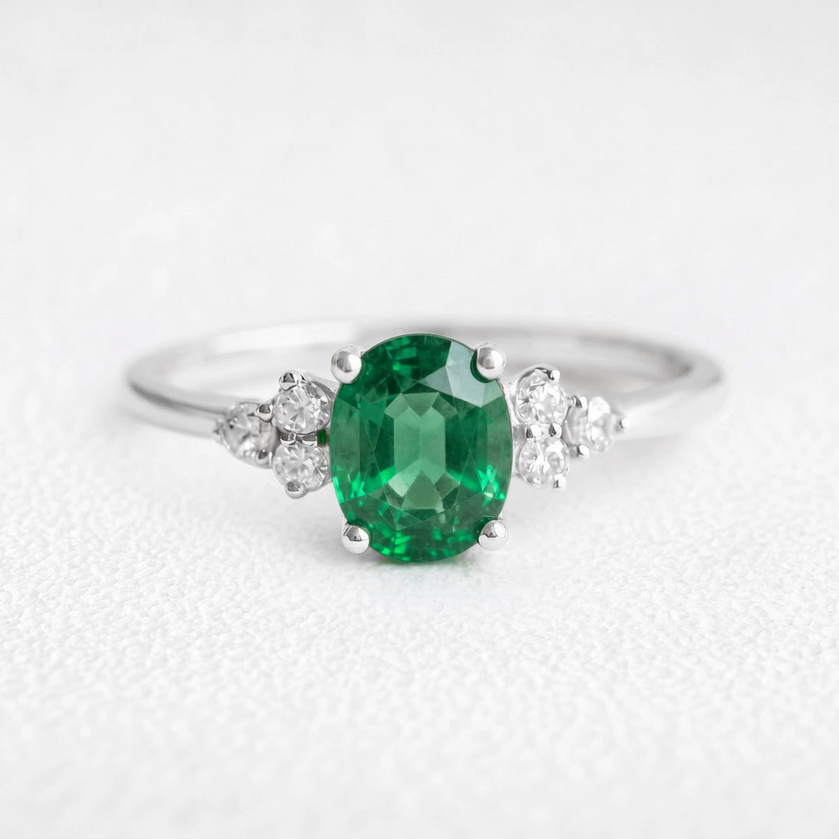 Alexandra’s Verdure | 1.5CT Oval Emerald & Diamond Cluster Engagement Ring