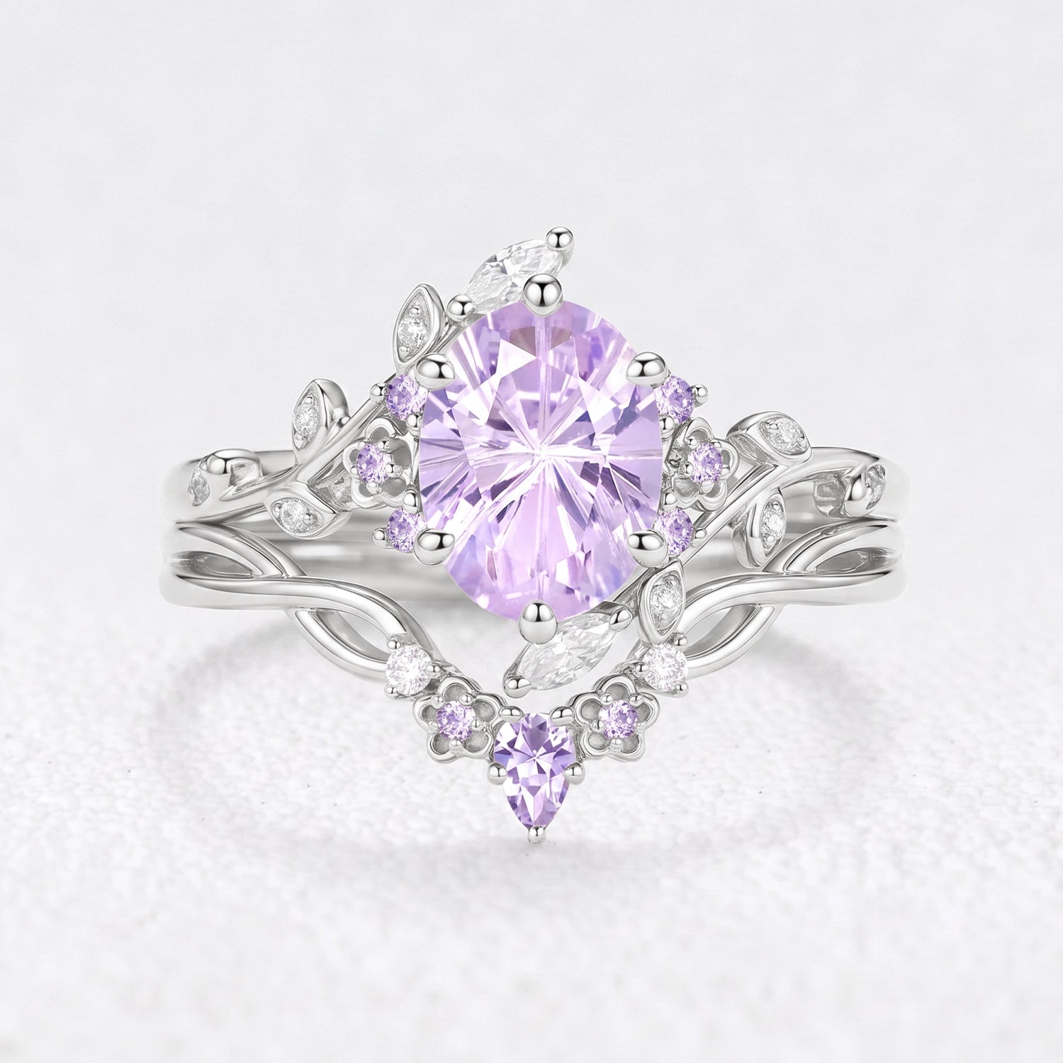 Eos‘s Aquarelle | Oval Firework Cut Lavender Sapphire Bridal Duo