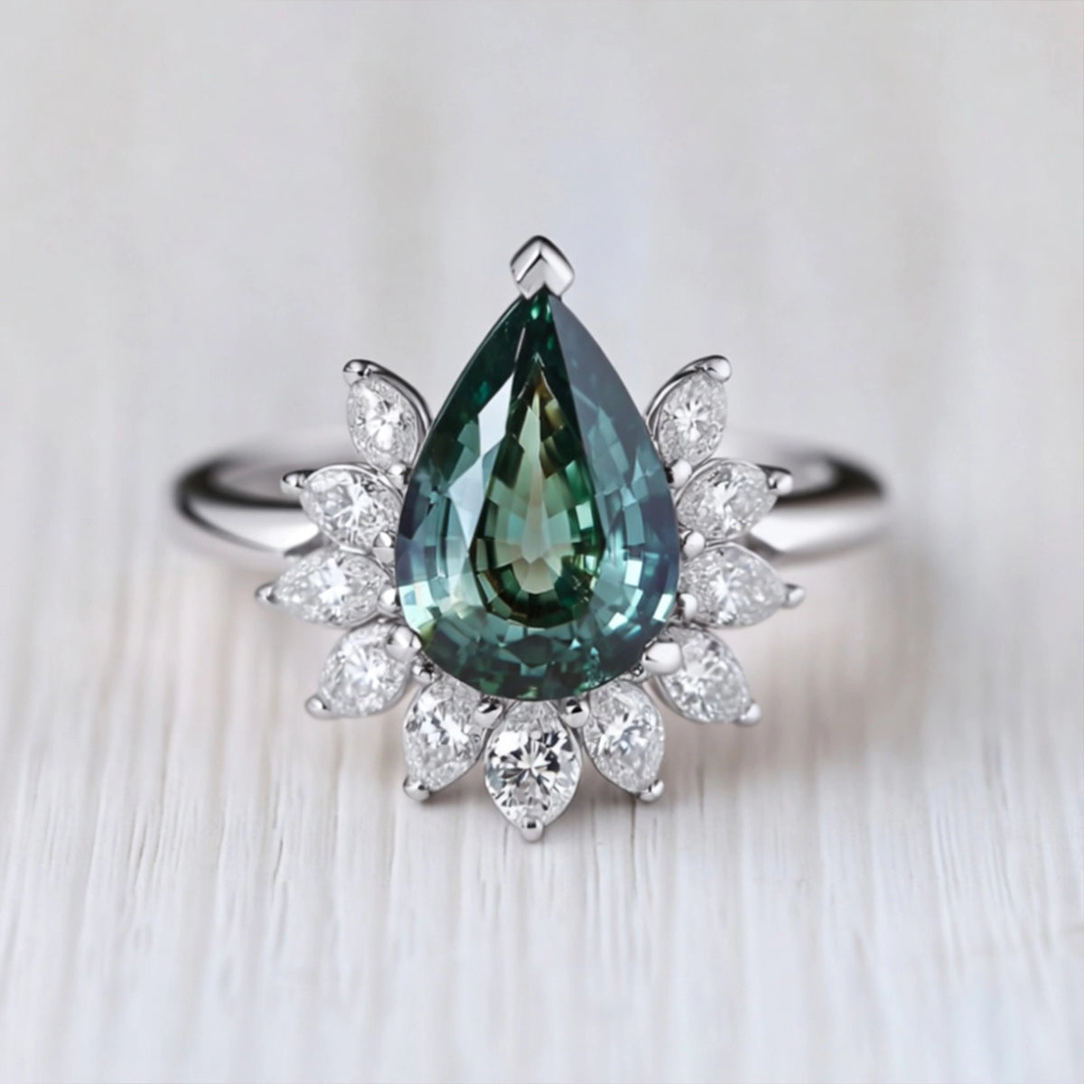 Lyra’s Hearth | Pear Teal Sapphire Engagement Ring.