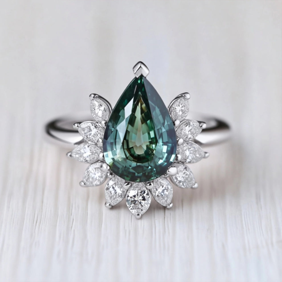 Lyra’s Hearth | Pear Teal Sapphire Engagement Ring.