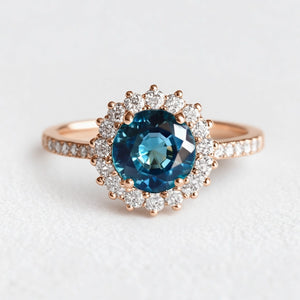 Stella's Spark | Vintage Blue Sapphire Diamond Halo Engagement Ring.