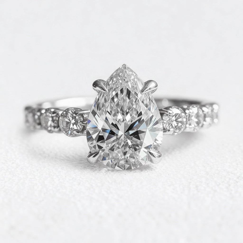 Aurora’s Radiance | 2CT Pear Cut Diamond Engagement Ring