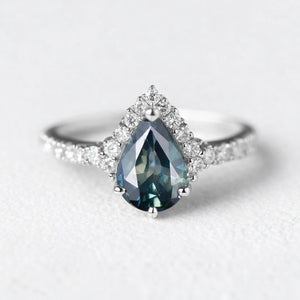 Aurora’s Teardrop | Pear Blue Sapphire Half-Halo Ring.