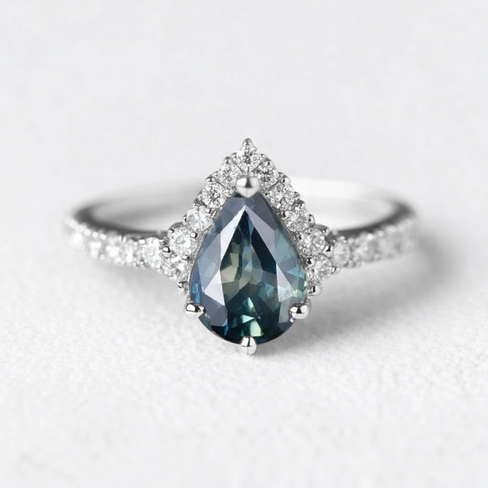 Aurora’s Teardrop | Pear Blue Sapphire Half-Halo Ring.
