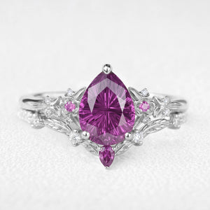 Theodora’s Diadem | Pear Fantasy-Cut Purple Sapphire Foliage Chevron Bridal Duo