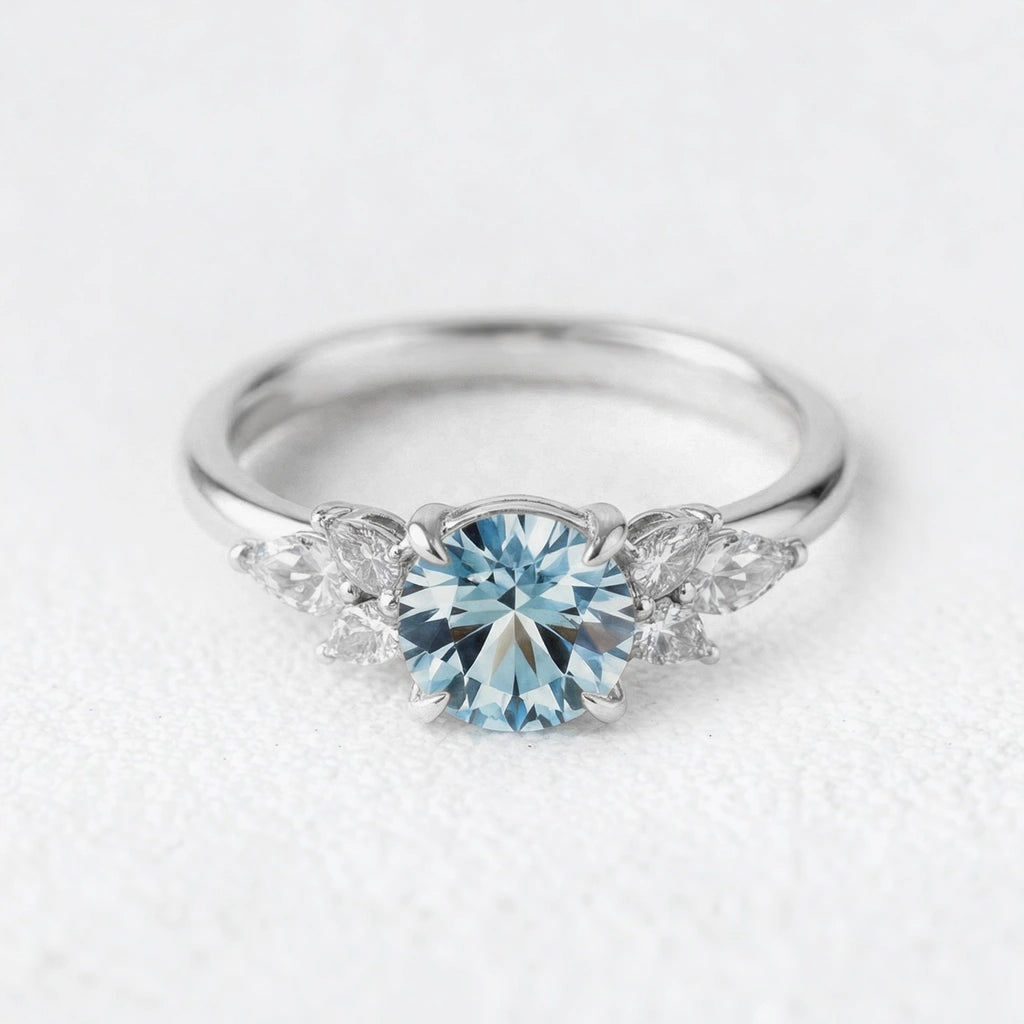 Selene’s Whisper | 1CT Round Cut Blue Sapphire Cluster Engagement Ring