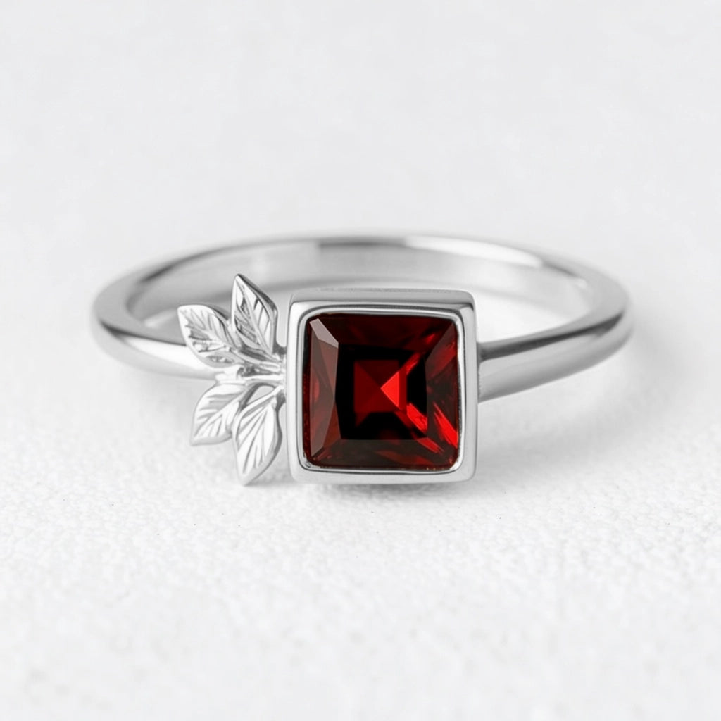 Rosalind’s Solace | Square Garnet Engagement Ring with Asymmetric Leaf.