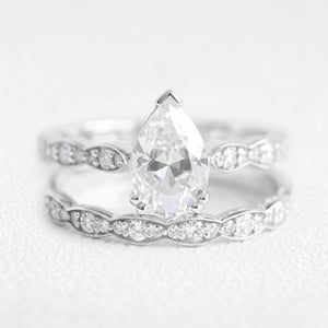 Genevieve’s Harmony | 1.5CT Pear Cut Diamond with Scalloped Pavé Bridal Duo