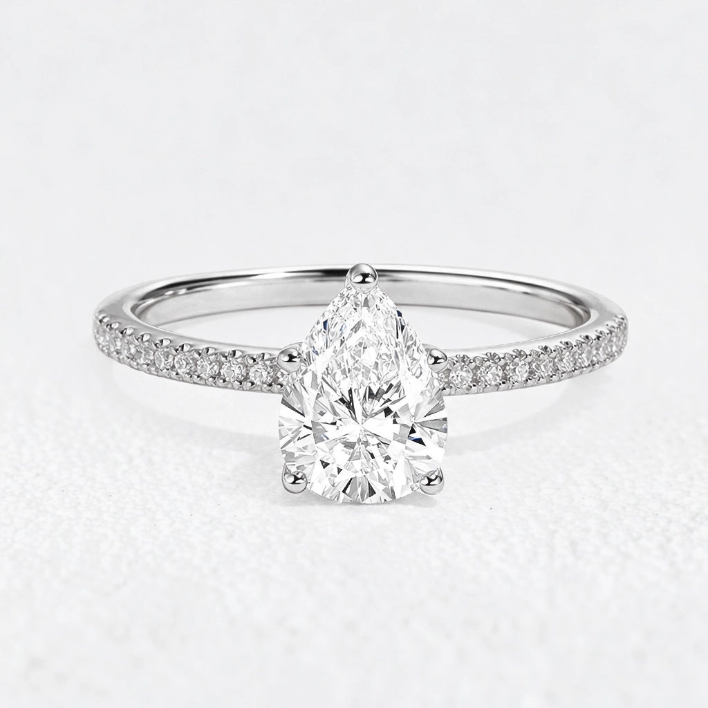 Lena’s Radiance | 1.5CT Pear Diamond Pavé Solitaire Engagement Ring