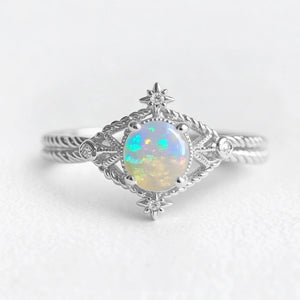 Aurora’s Knotwork | Round Opal Engagement Ring with Open Lozenge Weave & Nodes