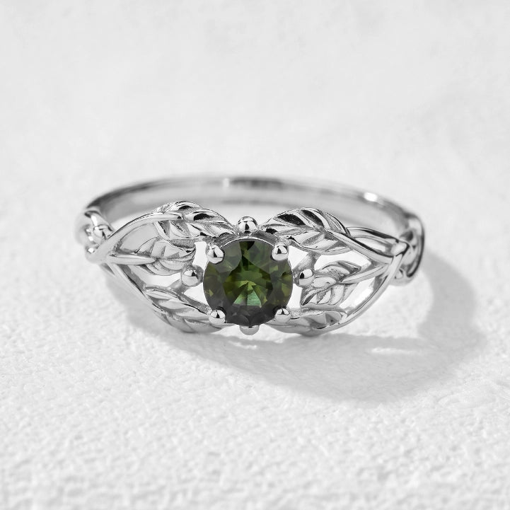Scarlett’s Laurel | Round Red Sapphire Solitaire with Laurel Leaves Engagement Ring.