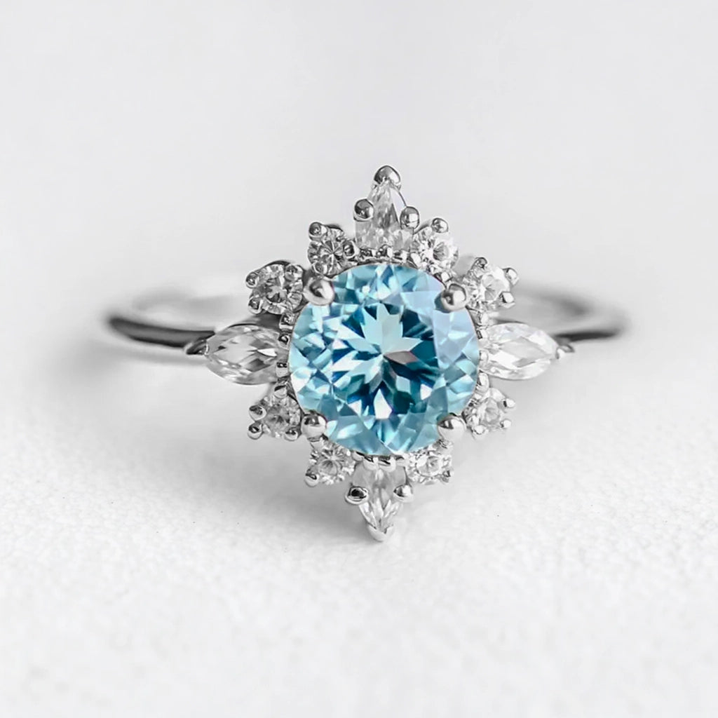 Marina's Swell | Round Cut Aquamarine Halo Engagement Ring.