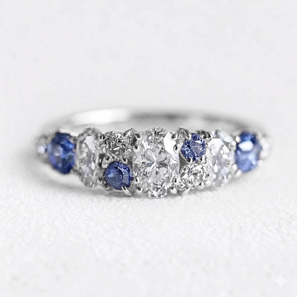 Cordelia’s Keepsake | Thistle Blue Sapphire & Moissanite Half‑Eternity Ring.
