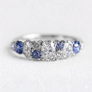 Cordelia’s Keepsake | Thistle Blue Sapphire & Moissanite Half‑Eternity Ring.