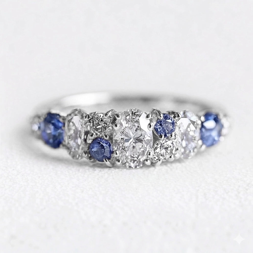 Cordelia’s Keepsake | Thistle Blue Sapphire & Moissanite Half‑Eternity Ring.