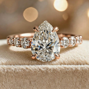 Aurora‘s Whisper | 2CT Pear Cut Moissanite Eternity Ring.