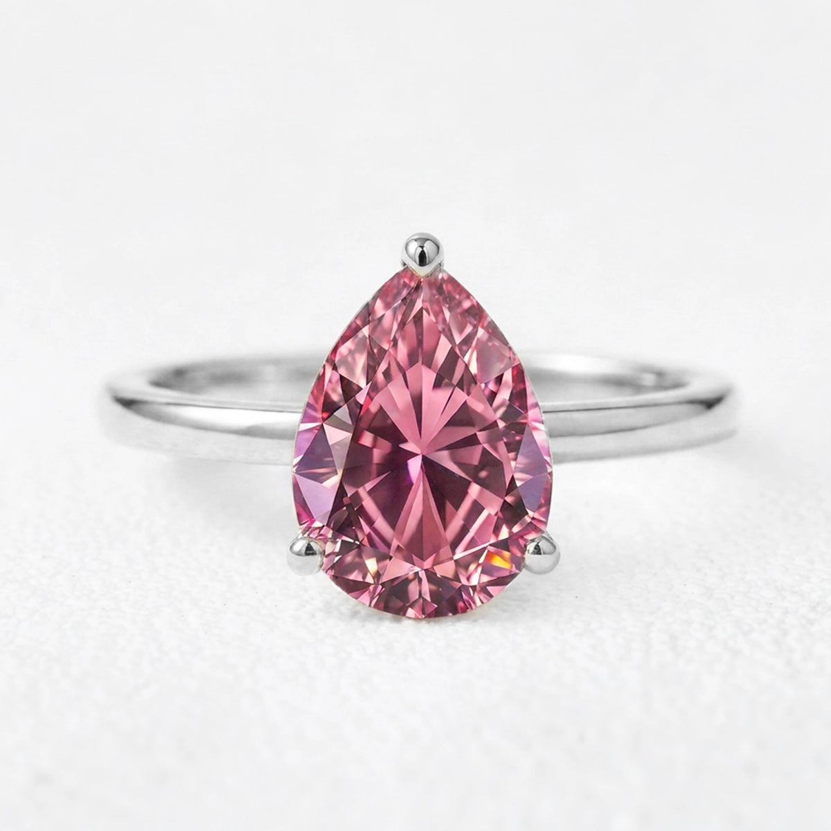 Celina's Reverie | 3CT Pear Cut Pink Sapphire Solitaire Engagement Ring
