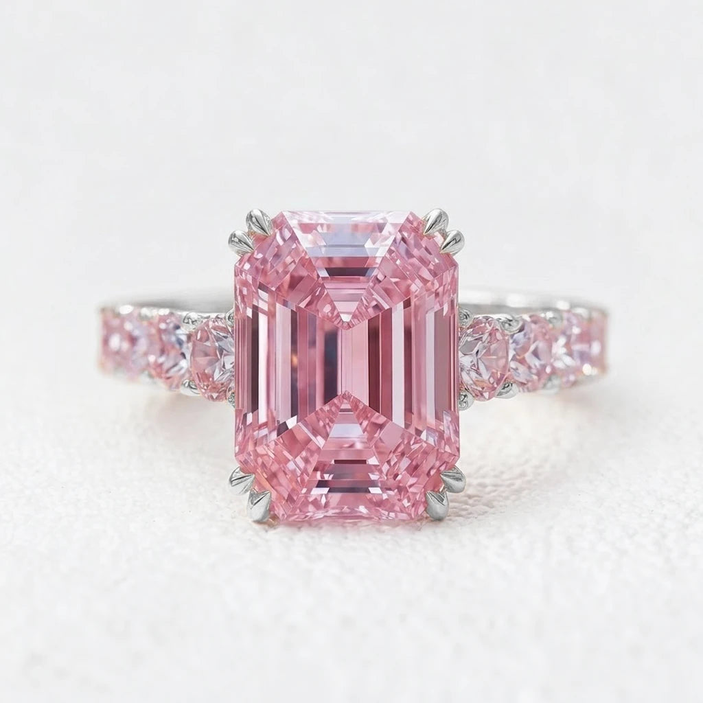 Aurora’s Aureole | 3CT Emerald Cut Pink Sapphire Engagement Ring
