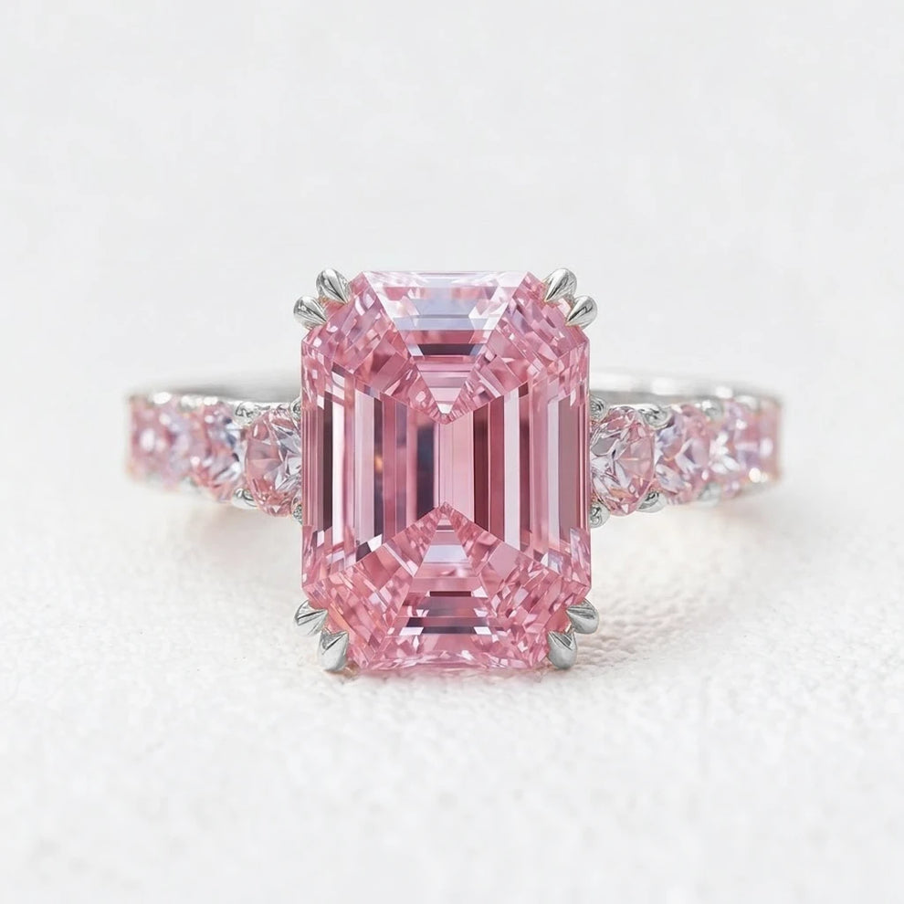 Aurora’s Aureole | 3CT Emerald Cut Pink Sapphire Engagement Ring