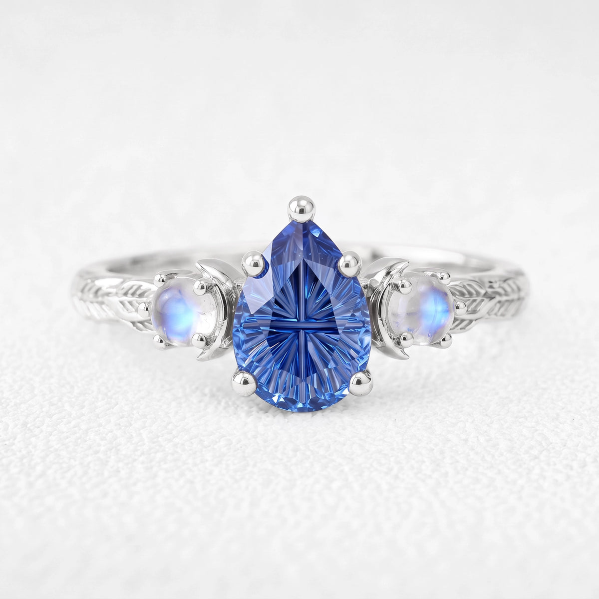 Asteria’s Moonveil | Pear Fantasy-Cut Royal Blue Sapphire & Moonstone Filigree Engagement Ring